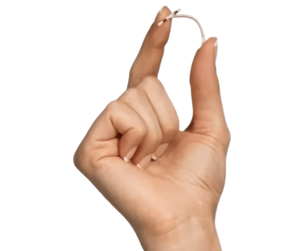 Hand holding the Paragard IUD showing how flexible it is